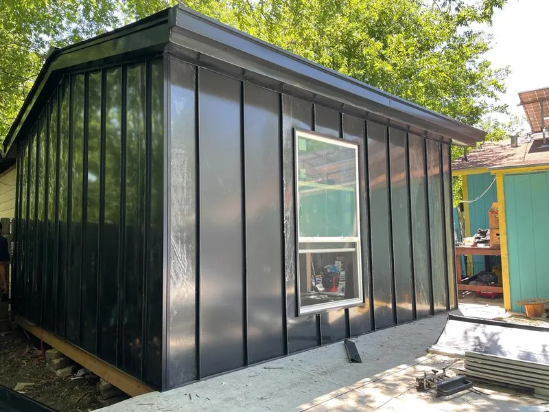 Black standing seam metal wall panels for Roof Inspection in Manhattan Beach